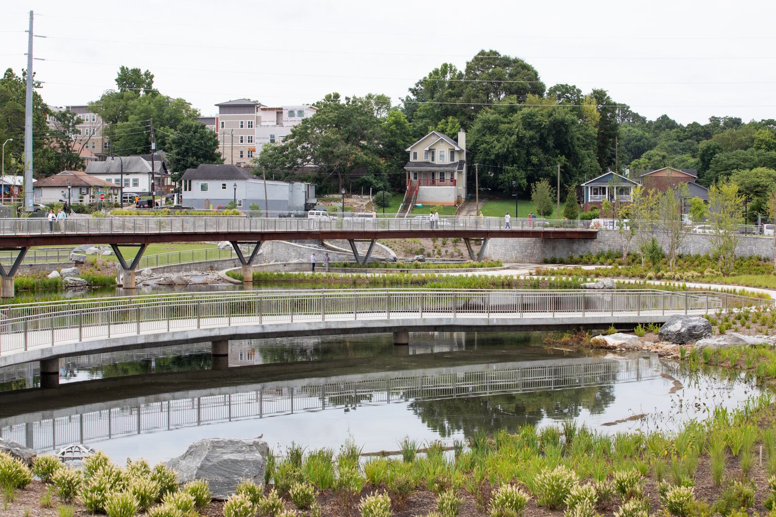 Homes are seen across the road at Rodney Cook Sr. Park in Vine City in Atlanta on Wednesday, June 7, 2021. (Photo/ Jenn Finch for The Atlanta Journal-Constitution)