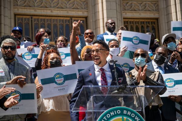 05/14/2021 — Atlanta, Georgia — Supporters cheer as Atlanta City Councilman Antonio Brown announces his run for Atlanta mayor during a press conference outside of Atlanta City Hall in Atlanta, Friday, May 14, 2021. (Alyssa Pointer / Alyssa.Pointer@ajc.com)