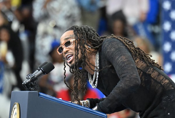 Rapper Quavo speaks at a rally for Vice President Kamala Harris at the Georgia State University’s convocation center in Atlanta on Tuesday, July 30, 2024.  It is her first campaign event in Georgia since she became the presumptive Democratic nominee. (Hyosub Shin / Hyosub.Shin / ajc.com)