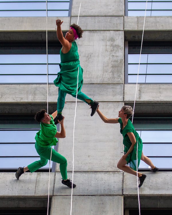 Bandaloop dancers perform on the side of a building facing the Atlanta Beltline on Sunday, October 3, 2021. (Photo: Steve Schaefer for The Atlanta Journal-Constitution)