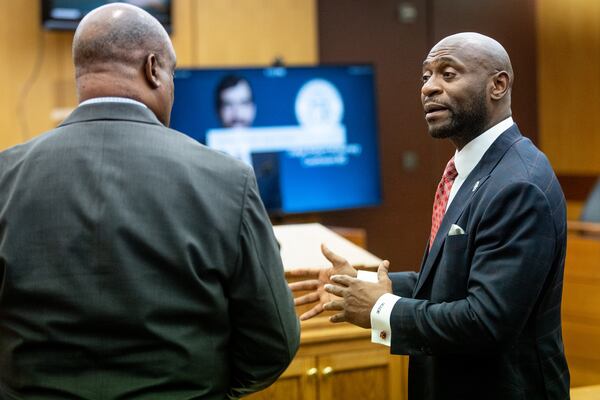 Rudy Giuliani's lawyer Bill Thomas (L) and special prosecutor Nathan Wade talk after a hearing in Fulton County Superior Court on Thursday, August 9, 2022. Steve Schaefer / steve.schaefer@ajc.com)