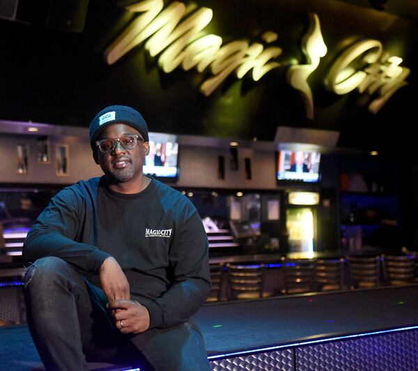 Daryl Mapp, director of branding for Magic City, takes a seat on the famous stage of the gentleman's club located in downtown Atlanta. Mapp says the club is fully prepared for the influx of patrons during Super Bowl 53. (RYON HORNE / RHORNE@AJC.COM)