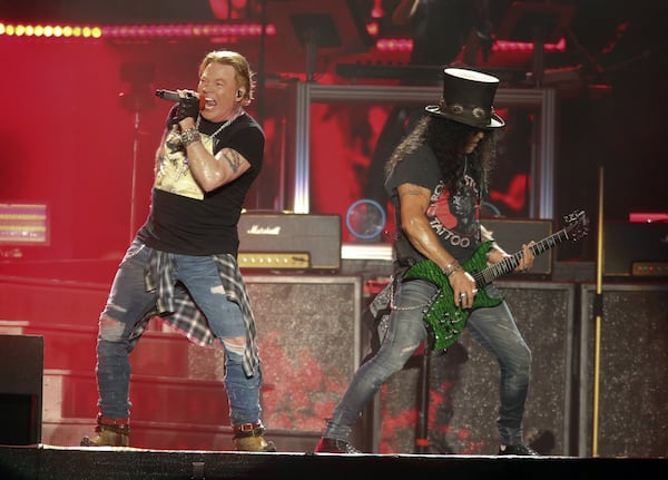 Guns N' Roses' Axl Rose, left, and Slash perform on the first weekend of the Austin City Limits Music Festival at Zilker Park on Friday, Oct. 4, 2019, in Austin, Texas. (Photo by Jack Plunkett/Invision/AP)