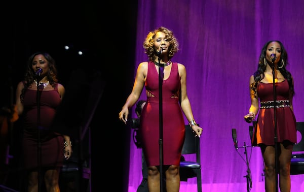 Nov. 22, 2014 ATLANTA: Aisha Morris, center, one of Steve Wonder's backup singers, is his daughter and the one for which he penned the hit song, "Isn't She Lovely." The legendary singer, musician, songwriter, Stevie Wonder brings his tour celebrating his landmark album, "Songs in the Key of Life," to Atlanta, performing to a sold-out audience at the Philips Arena. (Akili-Casundria Ramsess/Special to the AJC) Wonder's daughter, Aisha Morris (center) is well-known from "Isn't She Lovely." Photo: Akili-Casundria Ramsess/Special to the AJC.