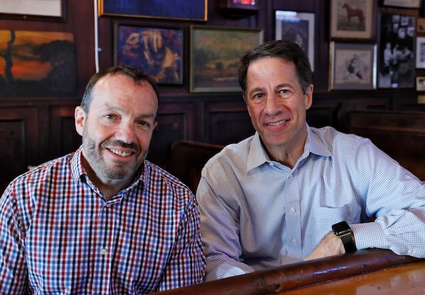 Kevin Salwen, left, and Kent Alexander are co-authors of "The Suspect," and served as consultants for "Richard Jewell," the   Clint Eastwood-directed movie due out next month. AJC photo:  Bob Andres / robert.andres@ajc.com