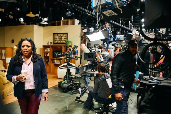 Sheila Ducksworth, executive producer of "Beyond the Gates," walks on the set at Assembly Atlanta, a studio complex in Doraville, on Thursday, Feb. 13, 2025. For Ducksworth, bringing this show to the air is the culmination of years of effort.  (Eric Hart/The New York Times)     