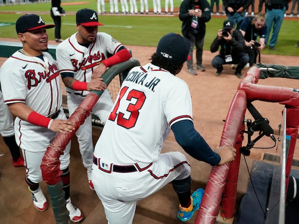 Braves outfielder Ronald Acuna (13) waits be introduced before Game 1 of the NLCS against the Los Angeles Dodgers Saturday, Oct. 16, 2021, at Truist Park in Atlanta. Acuna has been recovering from a knee injury suffered in July. (Ashley Landis/AP)