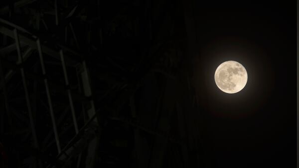 November 14, 2016 - Atlanta -  The "Super moon" passes behind Mercedes Benz Stadium construction.  BOB ANDRES  /BANDRES@AJC.COM