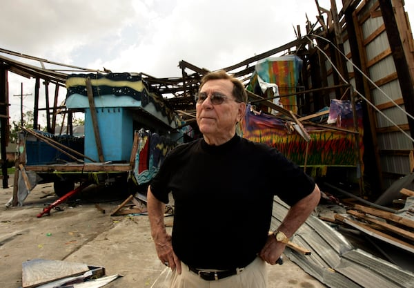 Blaine Kern Sr. looks over the damage by Hurricane Katrina to one of his warehouses at Mardi Gras World.