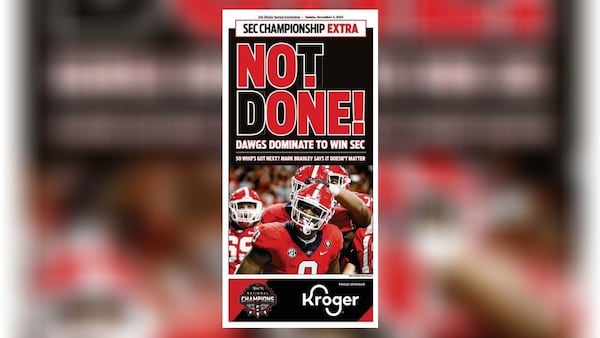 Atlanta Journal-Constitution ePaper bonus coverage of Georgia Bulldogs becoming SEC champions.