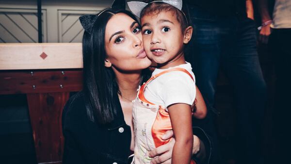 Kim Kardashian and daughter North West  in Inglewood, California Friday at the Forum for Ariana Grande's Dangerous Woman show.