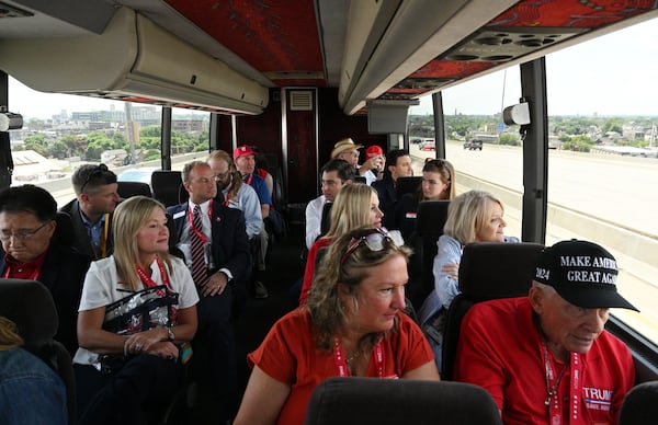 Georgia alternative delegates and staff ride a shuttle bus to attend the first day of Republican National Convention, Monday, July 15, 2024, in downtown Milwaukee, WI. (Hyosub Shin / AJC)