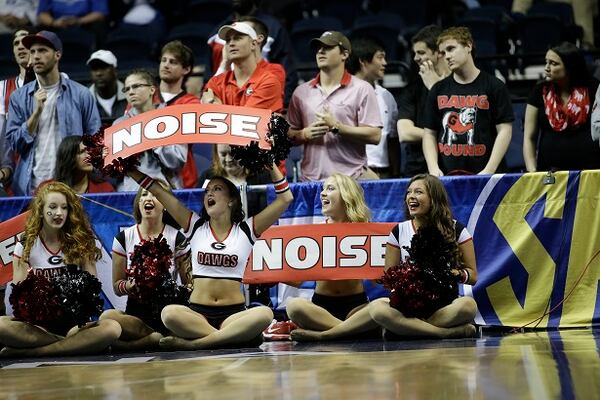 Georgia cheerleaders perform during the first half of an NCAA college basketball game in the quarterfinal round of the Southeastern Conference tournament between Georgia and South Carolina, Friday, March 13, 2015, in Nashville, Tenn. (AP Photo/Mark Humphrey) Might the Bulldogs make a little noise in Charlotte? (Mark Humphrey/AP photo)