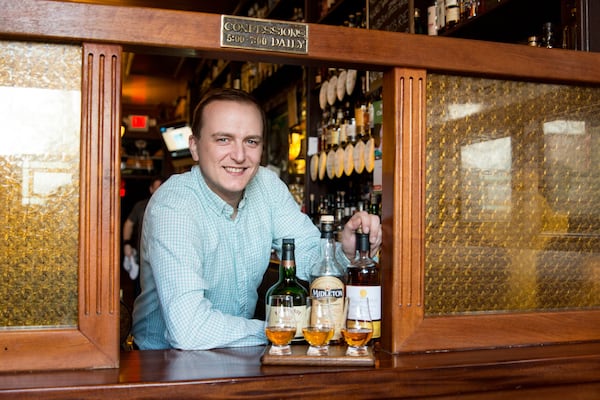 Mac McGee Irish Pub general manager Anton Quinn offers an Irish whiskey flight. CONTRIBUTED BY MIA YAKEL