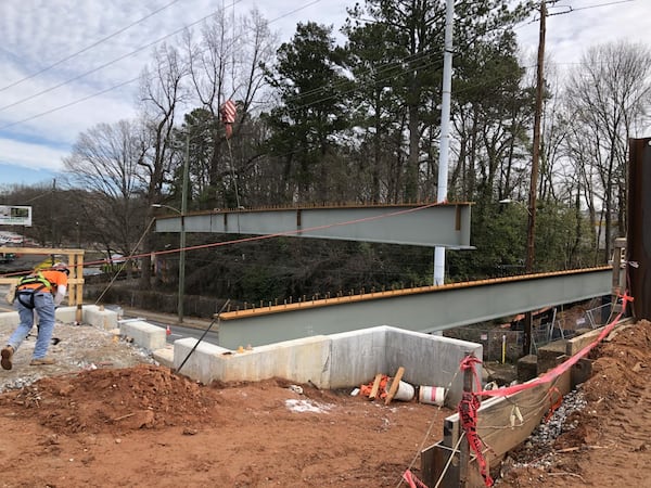 Beams being set in place for the new pedestrian trail over Metropolitan Parkway SW. (CONTRIBUTED)