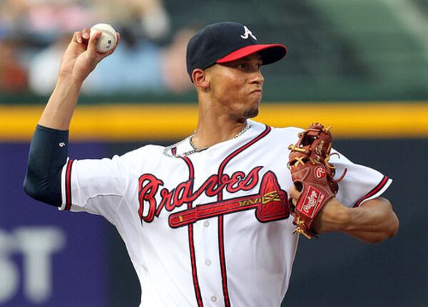 070212 ATLANTA: Braves shortstop Andrelton Simmons fields a ground ball by Cubs Starlin Castro for an out during first inning action at Turner Field in Atlanta on Monday, July 2, 2012. CURTIS COMPTON / CCOMPTON@AJC.COM When it comes to defense, there is none better than Braves shortstop Andrelton Simmons, who demonstrated that again Wednesday.