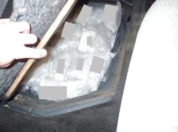 A photo of the hidden drugs found in a woman’s minivan as she was crossing into the U.S. from Mexico just after midnight on Monday.