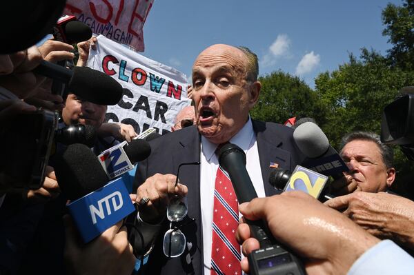 Rudy Giuliani speaks to members of the press outside the Fulton County Jail, Wednesday, August 23, 2023, in Atlanta. (Hyosub Shin / Hyosub.Shin@ajc.com)