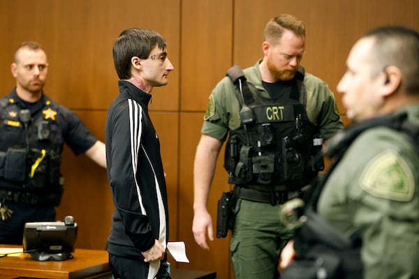 FILE - Robert Crimo III is escorted from the court room at a break in juror selection at the Lake County Courthouse Tuesday, Feb. 25, 2025, in Waukegan, Ill. (Brian Hill/Daily Herald via AP, Pool, File)