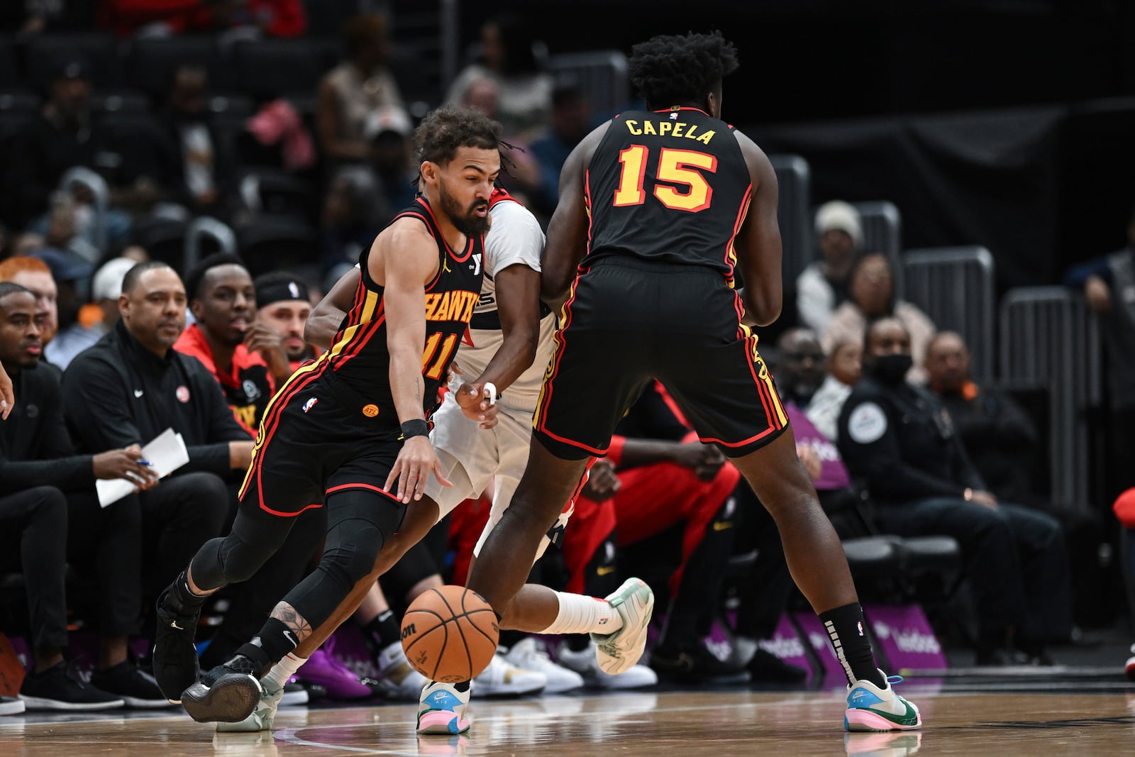 Atlanta Hawks guard Trae Young handles the ball during the first half of an NBA basketball game against the Washington Wizards, Wednesday, Oct. 30, 2024, in Washington. (AP Photo/Terrance Williams)