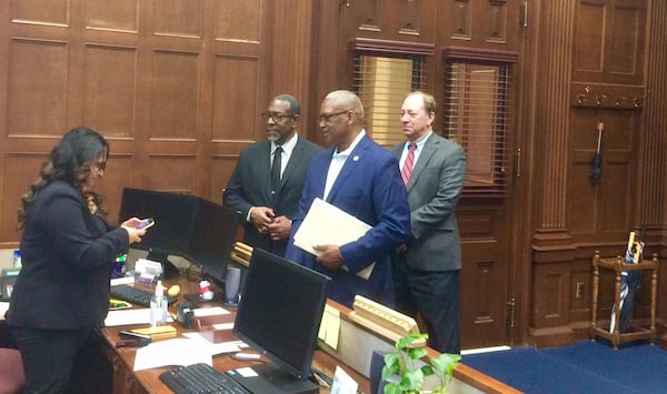 DeKalb County School Superintendent Steve Green (left), Democratic state Sen. Emanuel Jones of Decatur, and DeKalb school board member Marshall Orson try, unsuccessfully, to get an audience with Gov. Brian Kemp on Monday, May 13, 2019. Photo by Bill Torpy