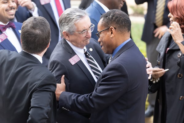 Representative Dale Washburn (Center) greets fellow Representatives at the State Capitol before the arrival of Speaker David Ralston's casket Tuesday, Nov. 22, 2022.  (Steve Schaefer/steve.schaefer@ajc.com)