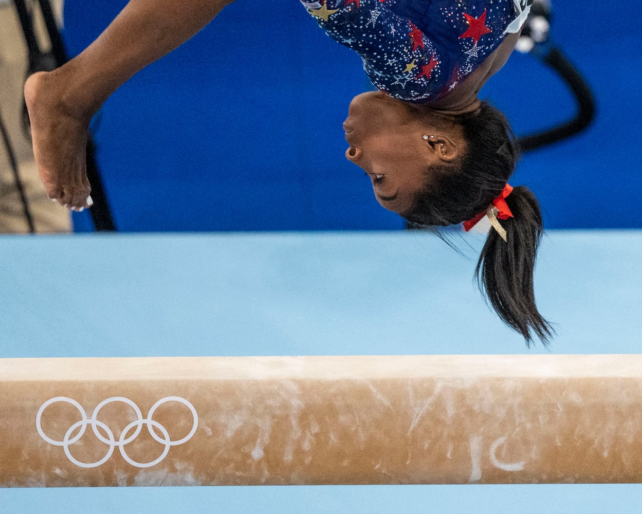 Simone Biles, of the United States, competes on the balance beam at the delayed 2020 Olympics in Tokyo, July 25, 2021. (Doug Mills/The New York Times)