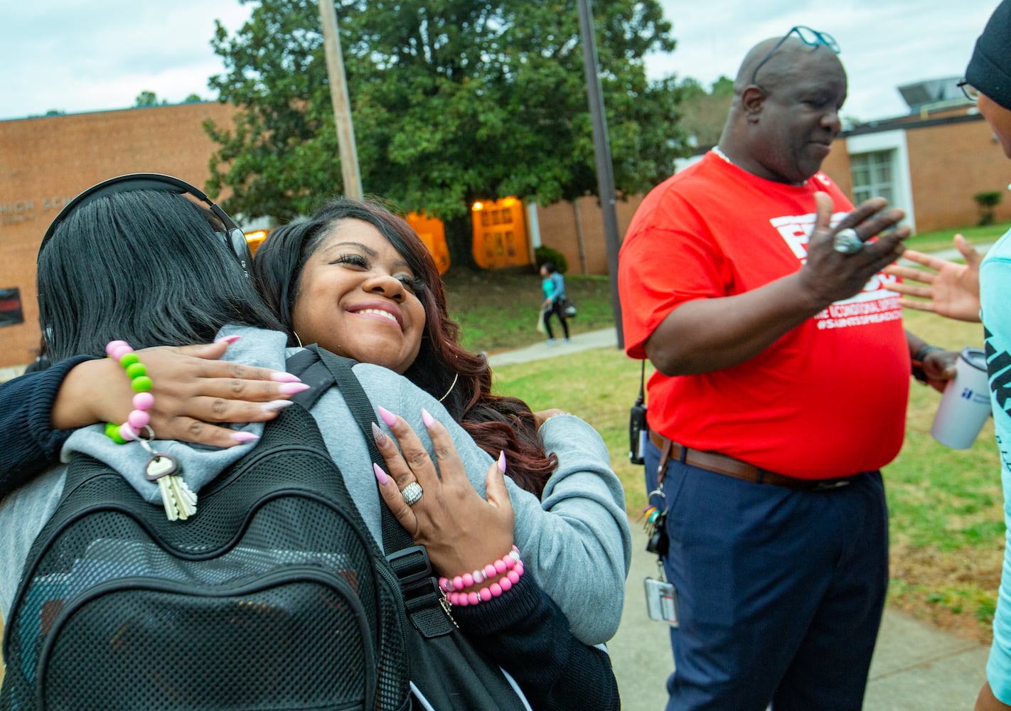 DeKalb County school hugs students every Wednesday on the way in to class