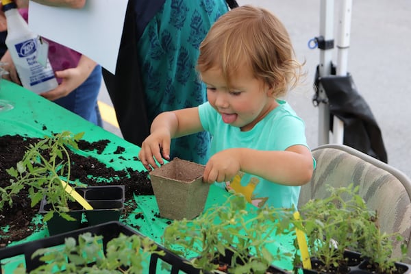 Kids activities like these organized by the Little Diggers at the Heritage Sandy Springs Museum and Park Farmers Market are a big draw for local families. CONTRIBUTED BY HERITAGE SANDY SPRINGS MUSEUM AND PARK STAFF