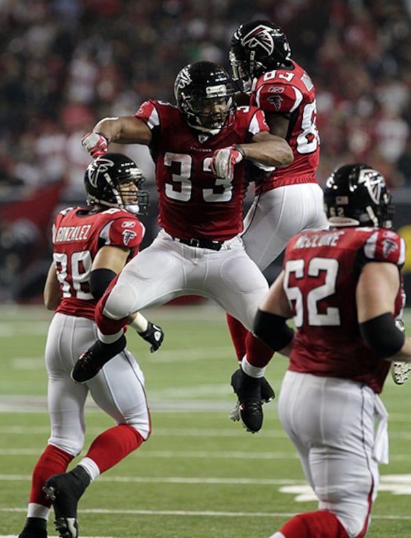 Michael Turner (33) had 6,081 rushing yards and a franchise-record 60 touchdowns in his five years in the Atlanta. (Curtis Compton / AJC)