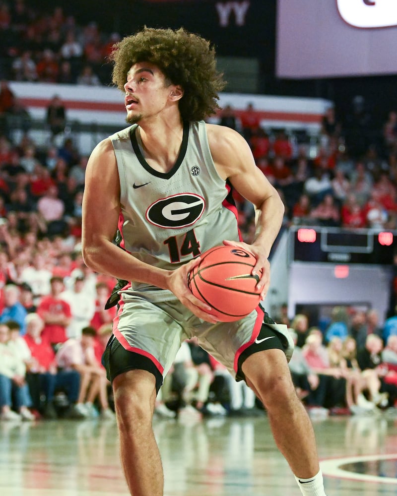 Georgia forward Asa Newell (14) drives to the basket against Vanderbilt during the second half of an NCAA Basketball game Saturday, March 8, 2025 at Stegeman Coliseum in Athens. Georgia beat Vanderbilt 79-68. (Daniel Varnado/For the Atlanta Journal-Constitution)