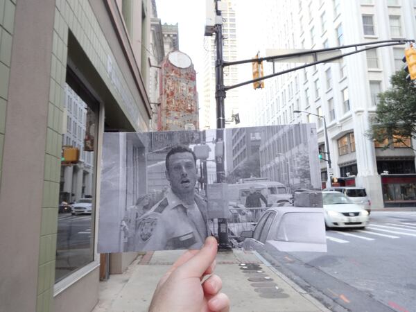 Christopher Moloney takes photos of movie stills set against the real-life scenery where they were shot. In 2014, Moloney moved to Atlanta and began to explore the city in the same way. Here, Rick passes under the Forsyth-Walton Building's Pipe Corner sign as he escapes from zombies in "The Walking Dead" pilot. (Christopher Moloney. Used with permission)