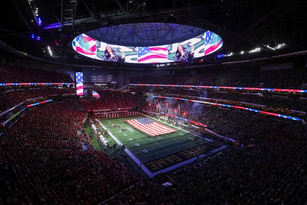 Fireworks go off during the national anthem before the 2025 National Championship between Ohio State and Notre Dame at Mercedes-Benz Stadium, Monday, Jan. 20, 2025, in Atlanta. (Jason Getz / AJC)