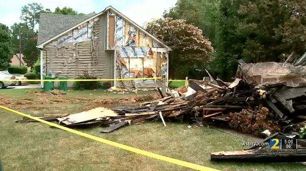 The blaze was so hot it melted the siding off nearby homes.