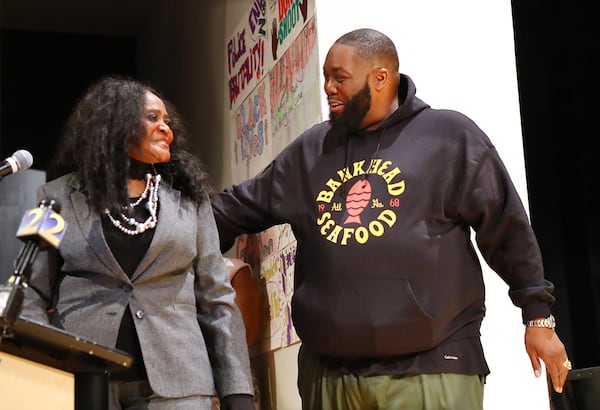 During his kickoff event for Bankhead Seafood, Michael Render (aka Killer Mike) introduces former owner Helen Brown Harden while speaking Thursday, Feb. 27, 2020, at his alma mater Frederick Douglass High School in Atlanta. CURTIS COMPTON / CCOMPTON@AJC.COM