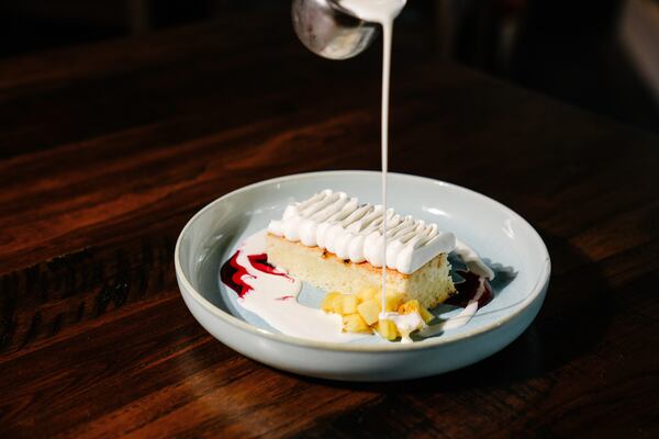 The cinco leches cake at Alta Toro gets milk poured over it at the table. Courtesy of Alta Toro 