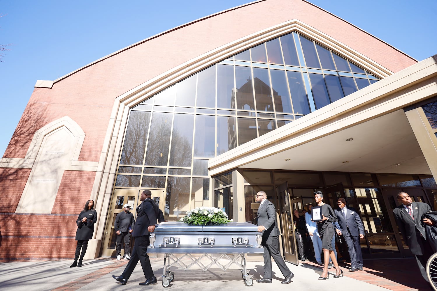 After the funeral service, pallbearers carry the remains of Cornelius Taylor out of Ebenezer Baptist Church. The remains will be placed in a horse-drawn carriage for a procession toward Atlanta City Hall on Monday, February 3, 2025.
(Miguel Martinez/ AJC)