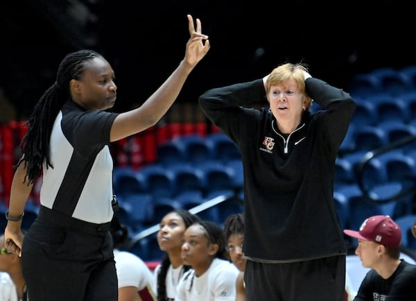 Hebron Christian's head coach Jan Azar reacts to a call during the first half of GHSA Basketball Class 3A Girl’s State Championship game at the Macon Centreplex, Friday, Mar. 8, 2024, in Macon. (Hyosub Shin / Hyosub.Shin@ajc.com)