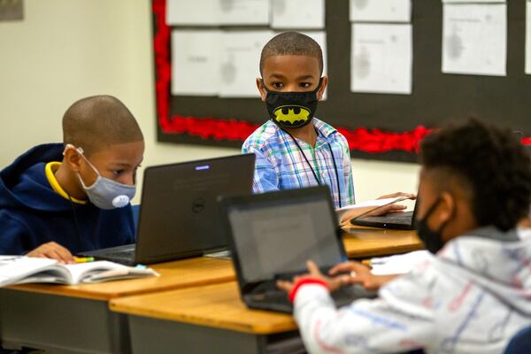 Stonewall Tell Elementary School third grader Malachi johnson works on his reading assignment Tuesday, Jan. 25, 2022.  The school did not report substantial absences in January, but it has numerous strategies to help students who do miss class. STEVE SCHAEFER FOR THE ATLANTA JOURNAL-CONSTITUTION