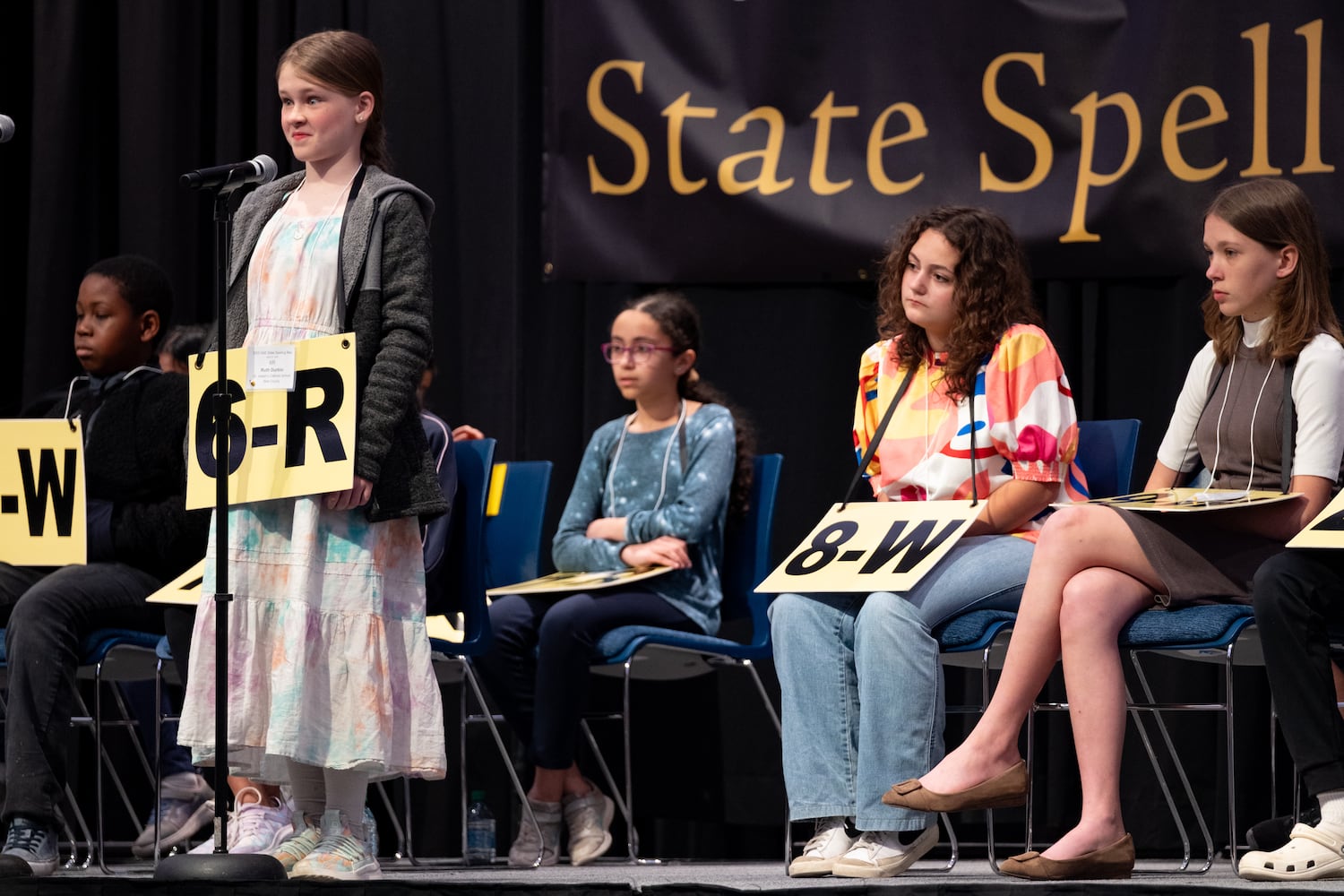 Ruth Durbin reacts after hearing her word at the GAE State Spelling Bee Championship at Georgia State University in Atlanta on Friday, March 21, 2025.   Ben Gray for the Atlanta Journal-Constitution