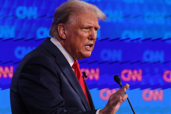 President Joe Biden and former President Donald Trump face off during their first presidential debate at CNN, Thursday, June 27, 2024, in Atlanta. (Jason Getz / AJC)
