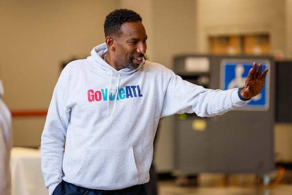 Atlanta mayor Andre Dickens waves to voters as he arrives at the C.T Martin Natatorium and Recreation Center in Fulton County during Election Day on Tuesday, Nov. 5, 2024.
(Miguel Martinez / AJC)