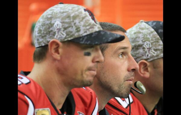 Falcons quarterback Matt Ryan and offensive coordinator Kyle Shanahan during the 24-21 loss to the Colts on Sunday. (Curtis Compton/AJC)