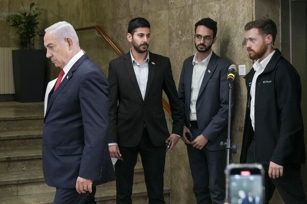 Israeli Prime Minister Benjamin Netanyahu arrives to a press conference in Jerusalem, Monday, Dec. 9, 2024. (AP Photo/Maya Alleruzzo, Pool)