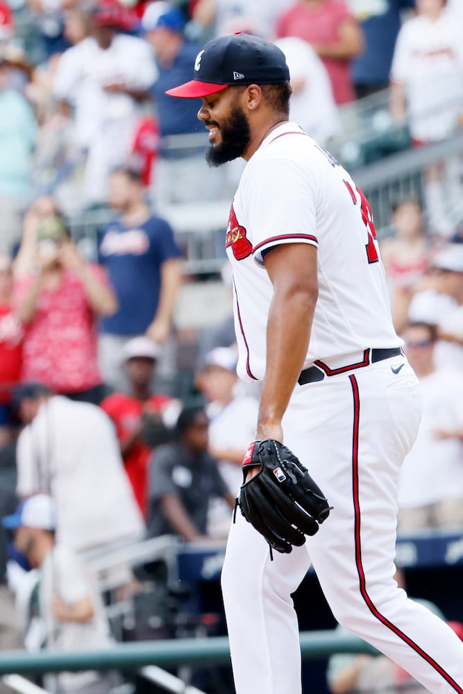 Atlanta Braves closer Kenley Jansen smiles after the team defeated the Pirates 5-3 on Sunday at Truist Park. (Miguel Martinez / miguel.martinezjimenez@ajc.com)