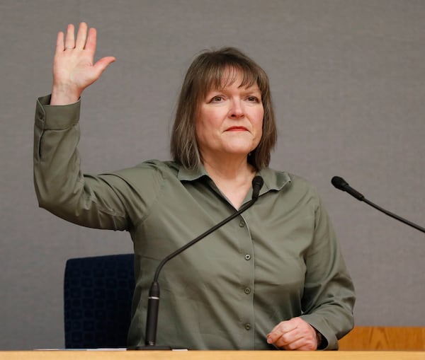 Dr. Michele Stauffenberg, the medical examiner who performed the autopsy on Emani Moss, is sworn in on April 26, 2019, at Gwinnett County Superior Court. 