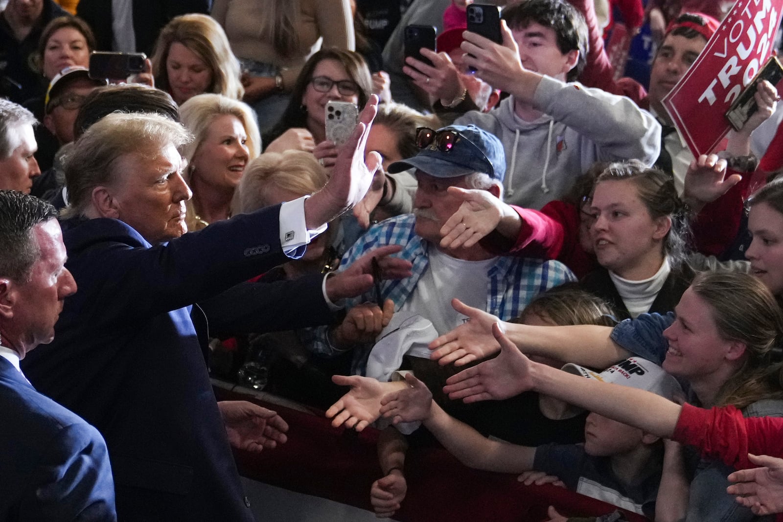 FILE - Republican presidential candidate former President Donald Trump greets supporters at a campaign rally in North Charleston, S.C., Feb. 14, 2024. (AP Photo/David Yeazell, File)