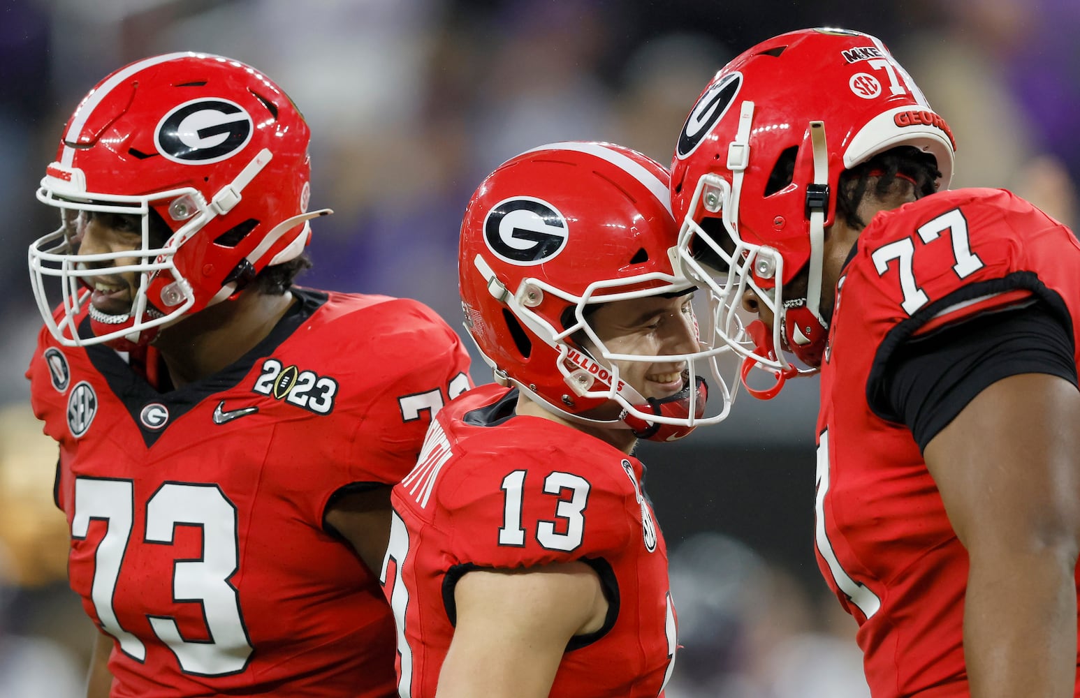 Georgia Bulldogs quarterback Stetson Bennett (13) celebrates a six yard touchdown against the TCU Horned Frogs during the first half of the College Football Playoff National Championship at SoFi Stadium in Los Angeles on Monday, January 9, 2023. (Jason Getz / Jason.Getz@ajc.com)