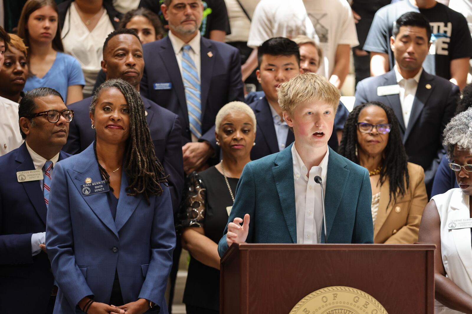 Nate Whipple, a senior at Lassiter High School in Cobb County and president of the Georgia High School Democrats, speaks at the Georgia State Capitol during a press conference on Wednesday, July 24, 2024, to respond to the state's decision to defund the AP African American Studies course. (Natrice Miller/ AJC)