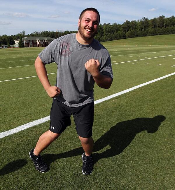 Peter Konz, here doing the Dirty Bird after being drafted by the Falcons in 2012. (By Curtis Compton/ccompton@ajc.com)